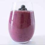 Glass of a Berry-Licious Blast AIP breakfast smoothie.