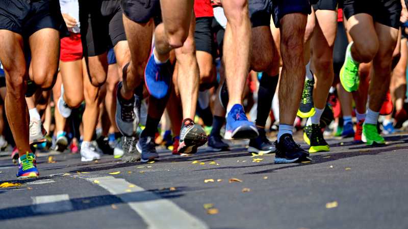 Runners hydrated with the salt tablets and himalayan salt taking off at the start of a marathon