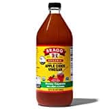 Bottle of Bragg Organic Apple Cider Vinegar Wellness Cleanse that has apple cider vinegar and honey. 