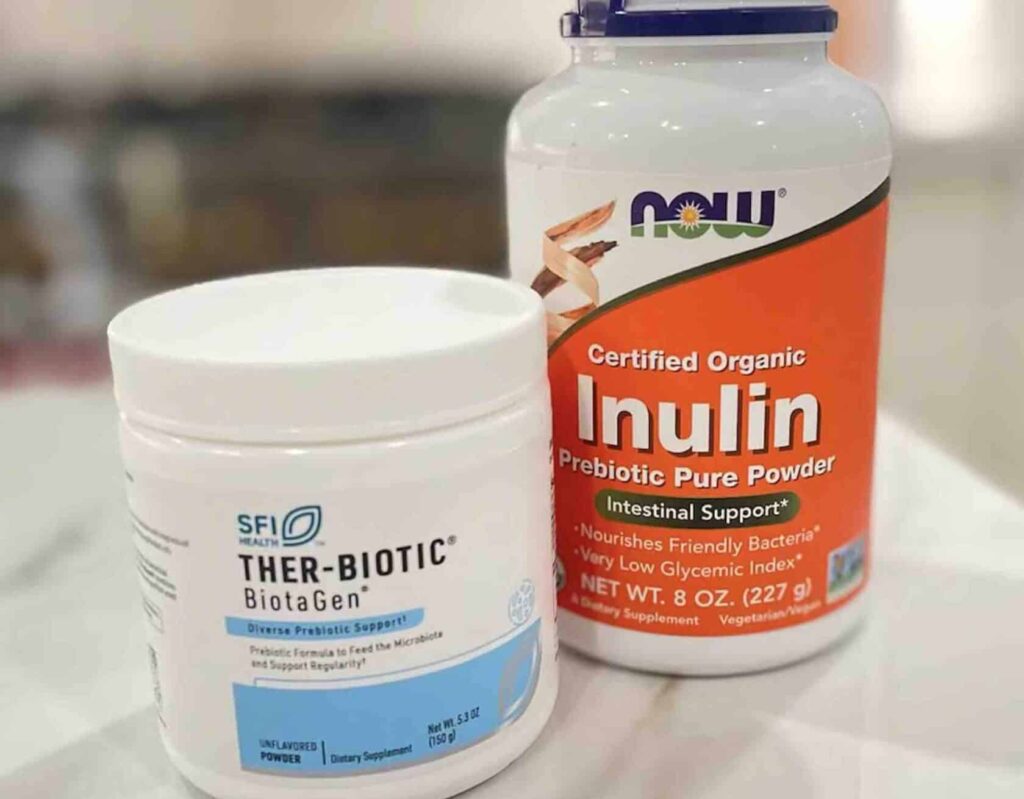 Picture of 2 prebiotic supplements to help increase the benefit of taking probiotics. This picture shows Ther-Biotic Biotagen by SFI and Organic Inulin by NOW Nutrition.