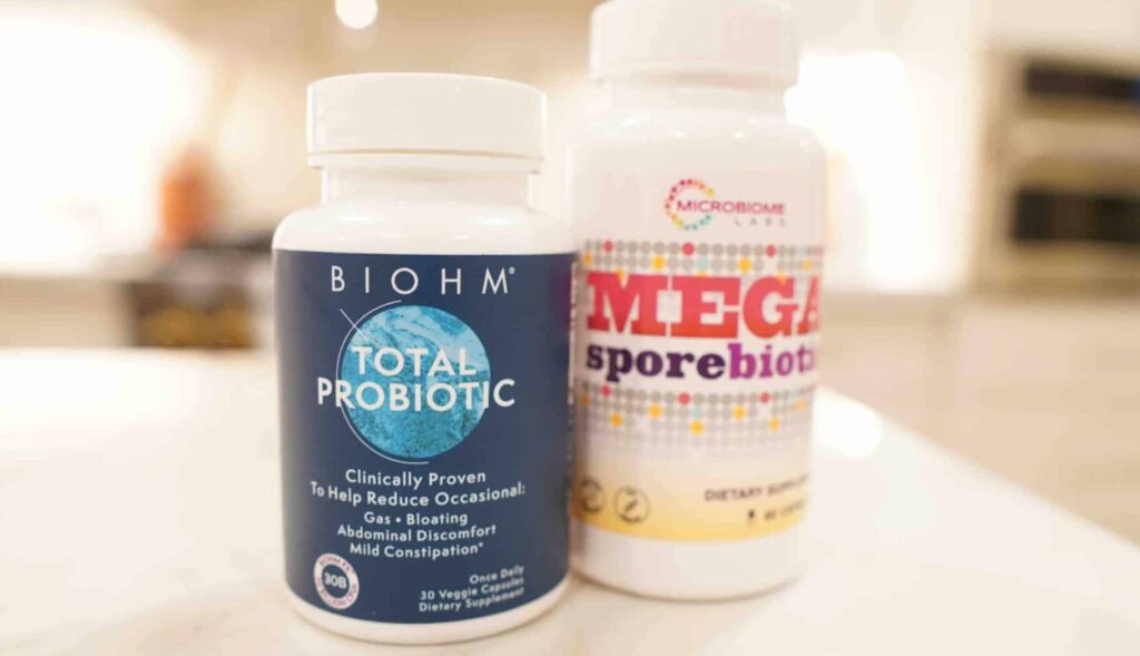 Picture of two common probiotic supplements that may help reduce period-related supplements.