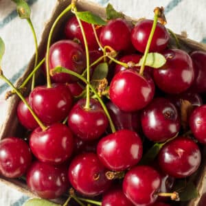 A bushel oif tart cherries which is one of many foods that help joint pain 