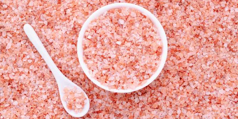 himalayan salt for runners. Scoop and bowl of pink himalayan sea salt. 