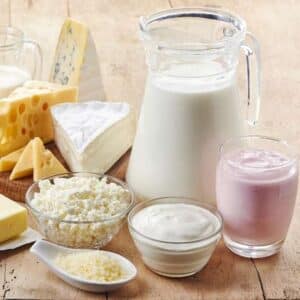 Group of dairy foods such as milk, yogurt, and cheese whjich are foods to avoid with leaky gut syndrome. 