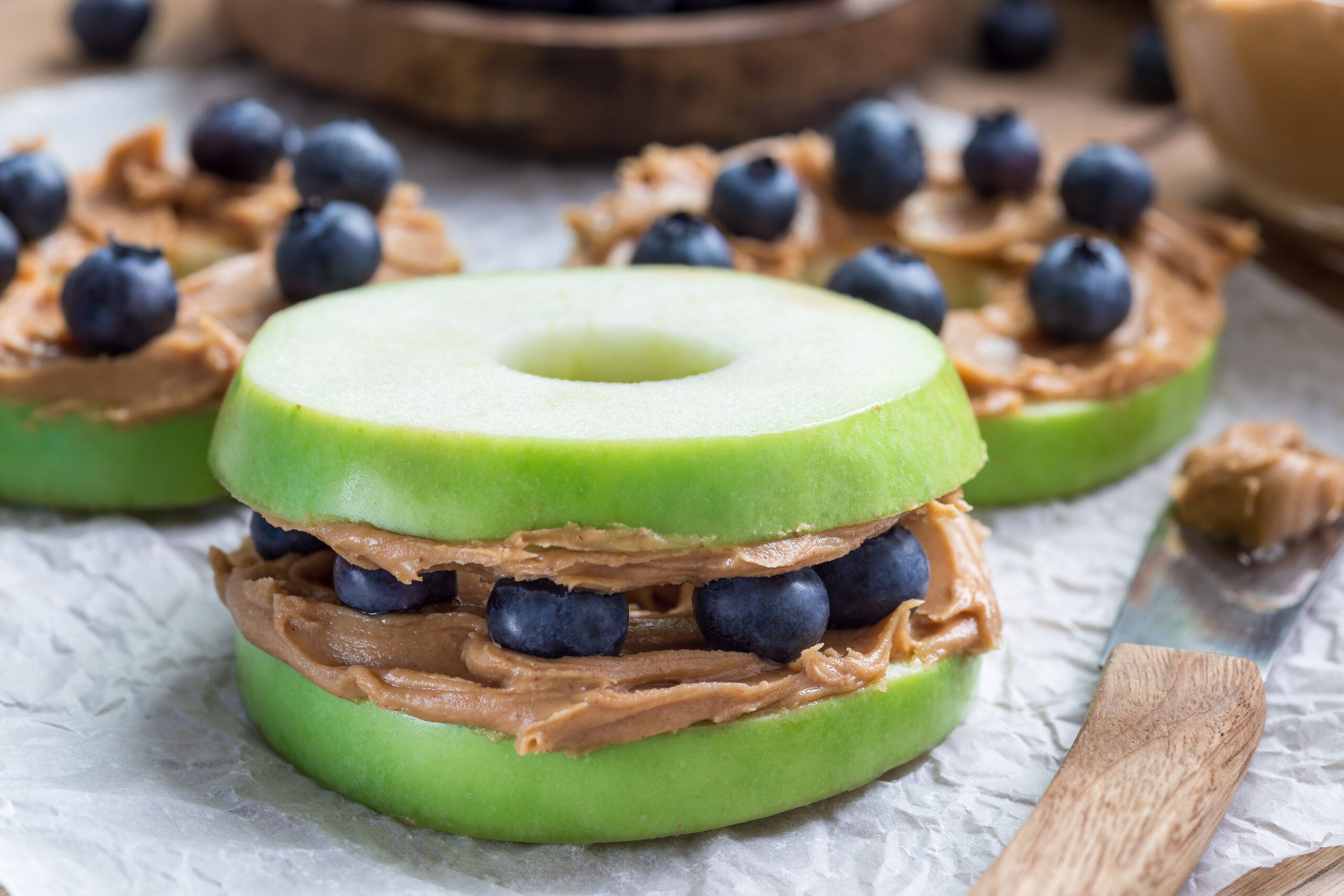 Peanut free snack list 2022 sandwich with apple, blueberries, and almond butter. 
