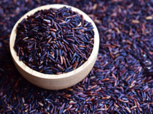 Uncooked purple rice also known as riceberry