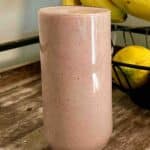 Glass of an strawberry pineapple AIP breakfast smoothie.